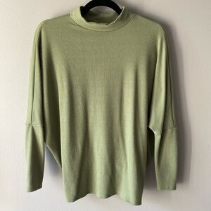 NWOT - Buckle Black - long sleeve turtle neck open back top